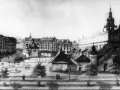 Rynek Główny w Krakowie, z Sukiennicami i Ratuszem. Obraz ukazuje tętniące życiem miasto, które od wieków fascynuje. Ile lat ma Kraków? Tysiąc!