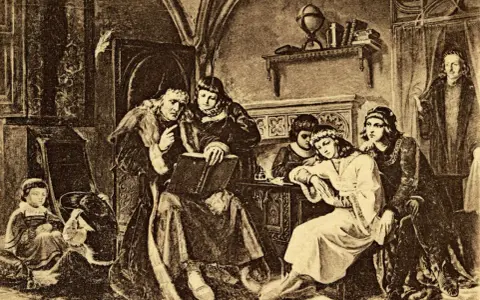 Kazimierz IV Jagiellończyk z dziećmi w komnacie. Król czyta księgę, dzieci słuchają.