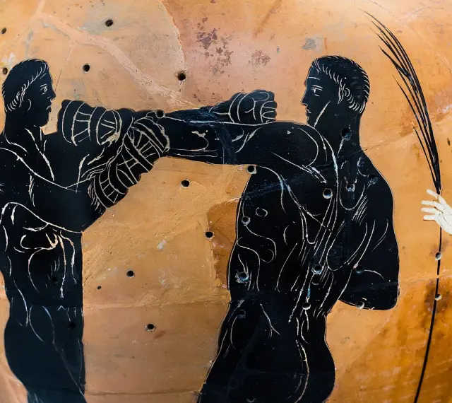 Starożytni Grecy rywalizowali w boksie na igrzyskach olimpijskich. Widok na greckim wazonie.